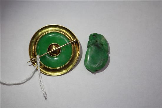 A 14k gold mounted jadeite and cultured pearl circular brooch and a 19th century jadeite carving, brooch 36mm.